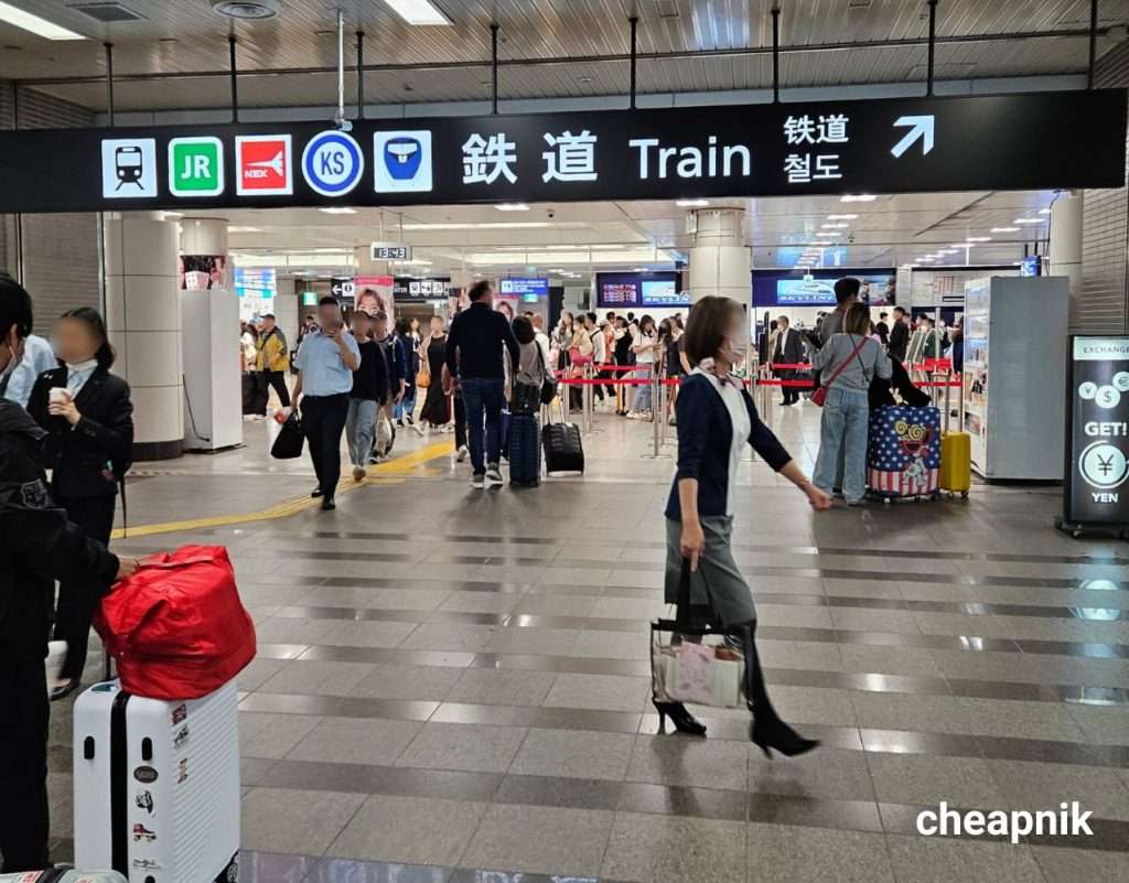 Signs to the trains at Narita Airport