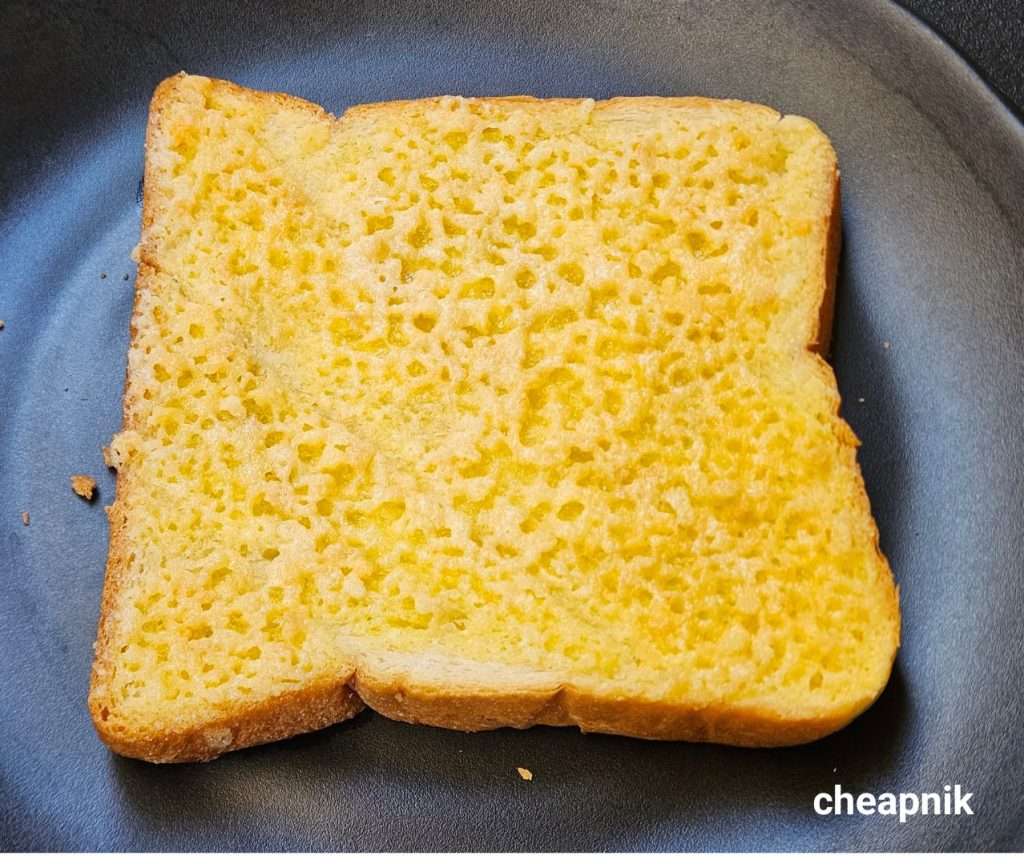 Freshly toasted bread with Kaldi Coffee Farm's Melon Pan Spread. Can you see the melon texture?