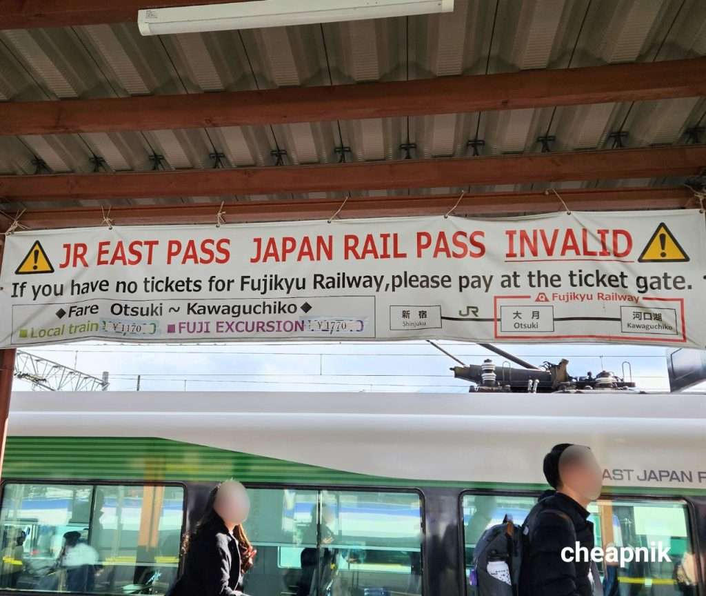 Signage at Kawaguchiko Station saying that JR Pass is not valid at the Fujikyu Railway