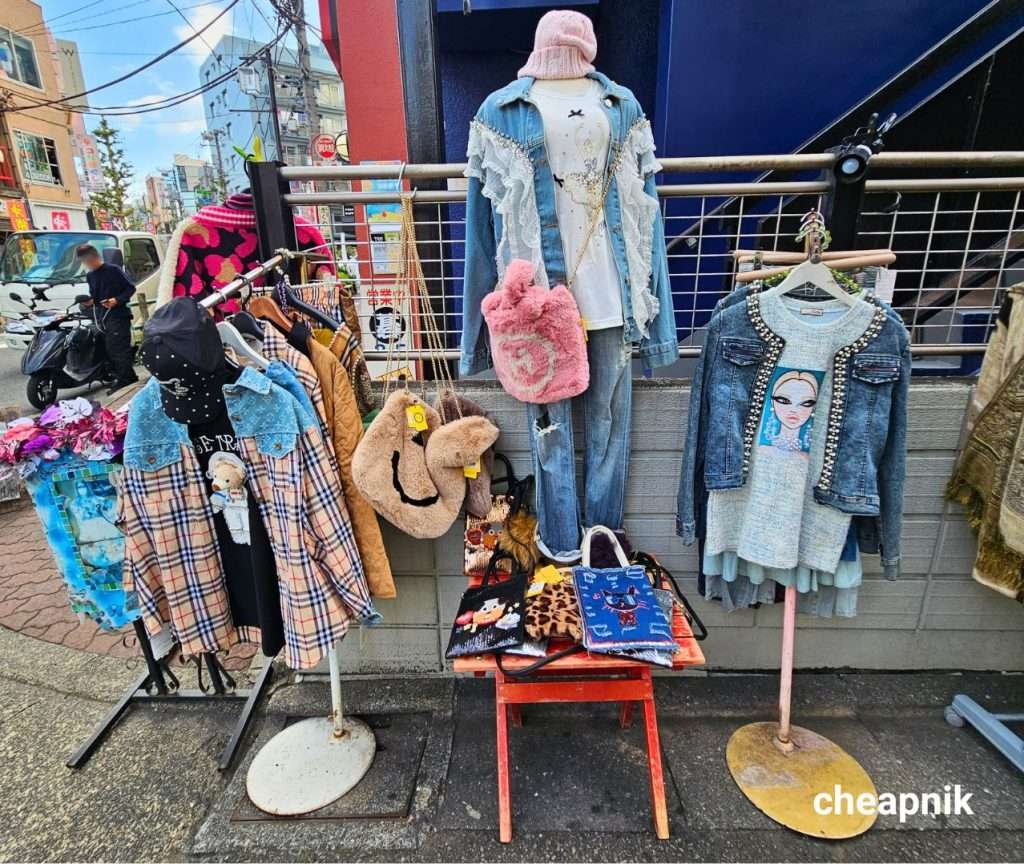 Clothes for sale along a street in Shimokitazawa