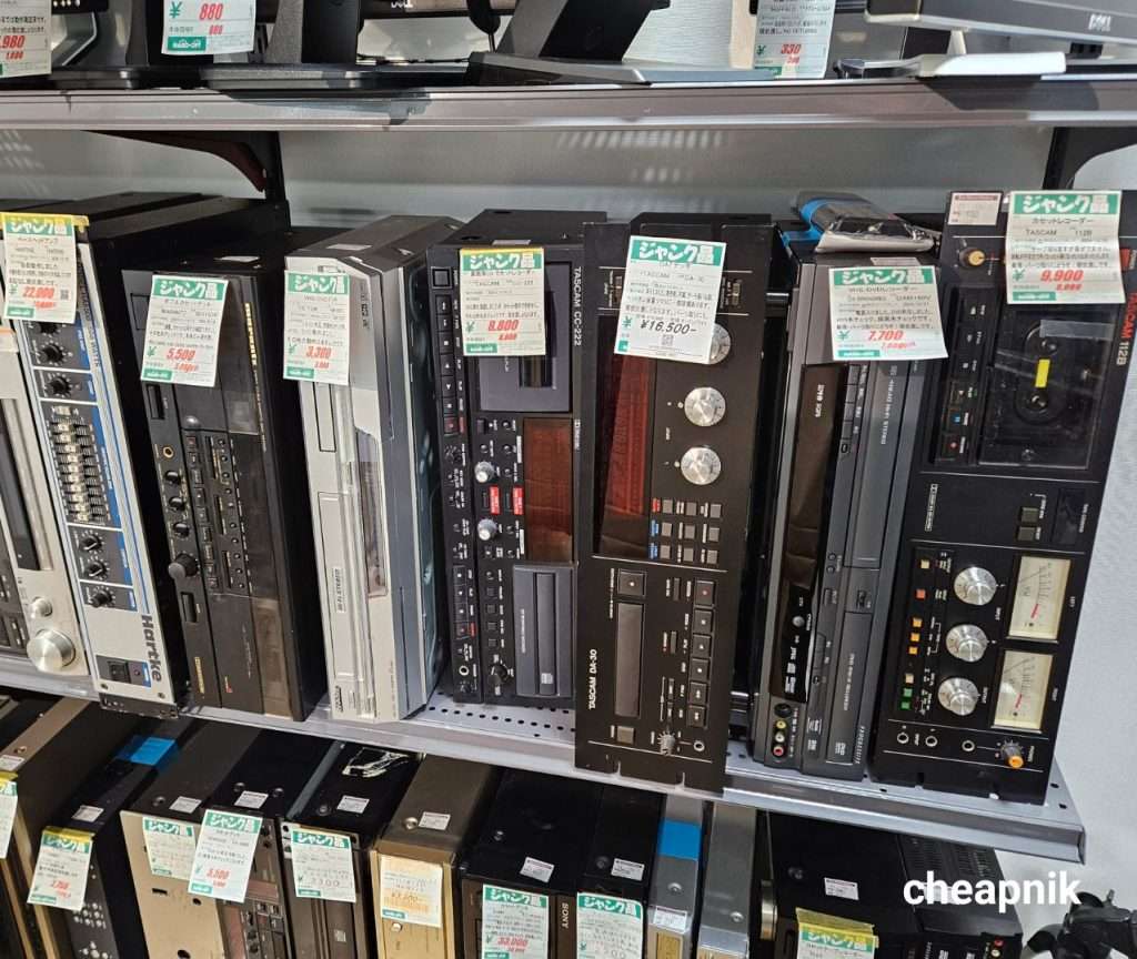 Used Hartke, Marantz, Victor, Tascam amplifiers, VHS DVD CD cassette players sold as Junk at Hard Off