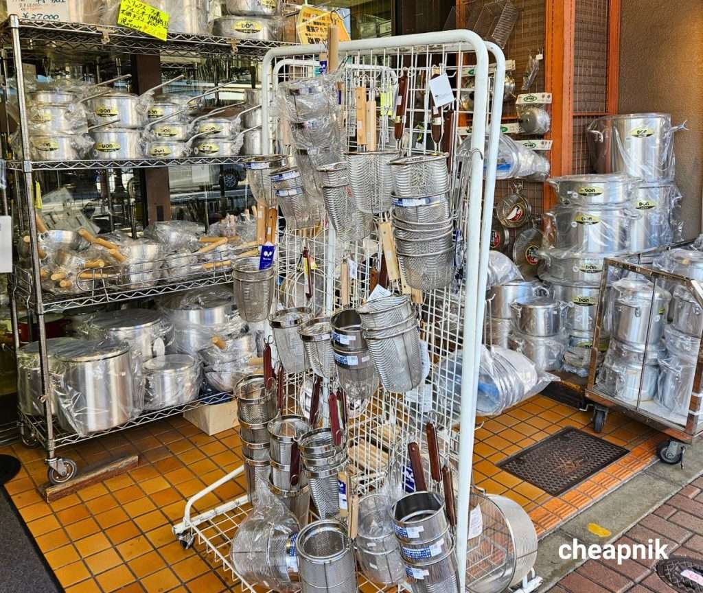 Strainers and pans for sale at Kappabashi Dougugai Kitchen Town