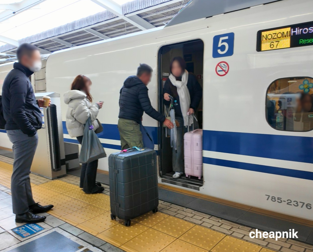 Passengers boarding Nozomi Shinkansen Train